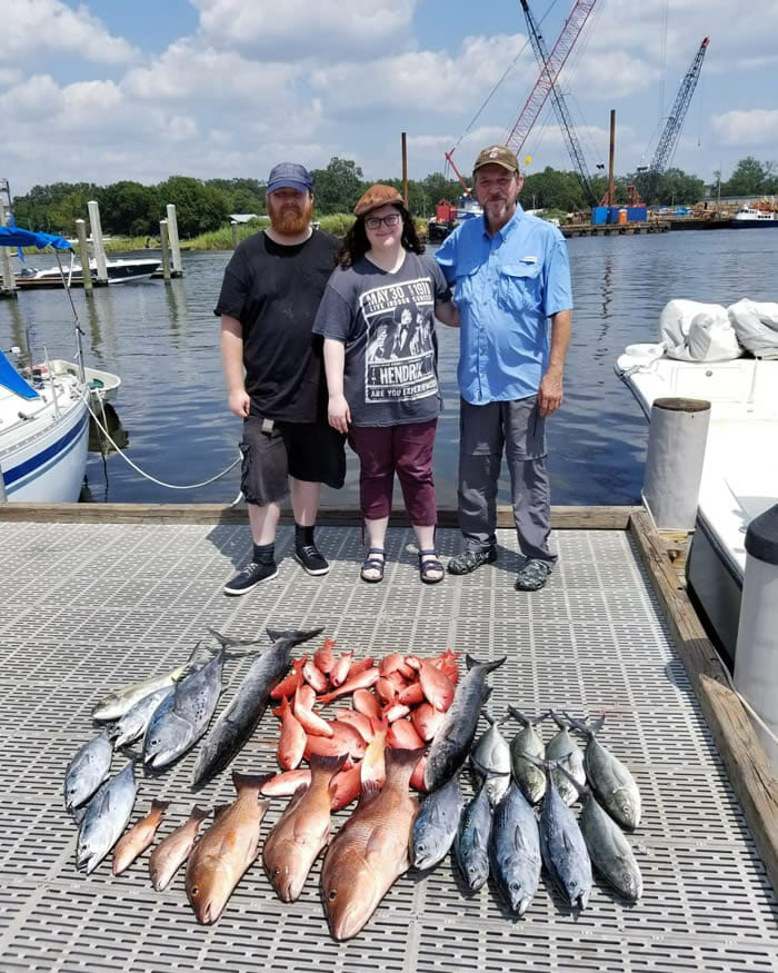 A group of anglers with their catch after a 6 hour offshore fishing trip with Next Generation Fishing Charters